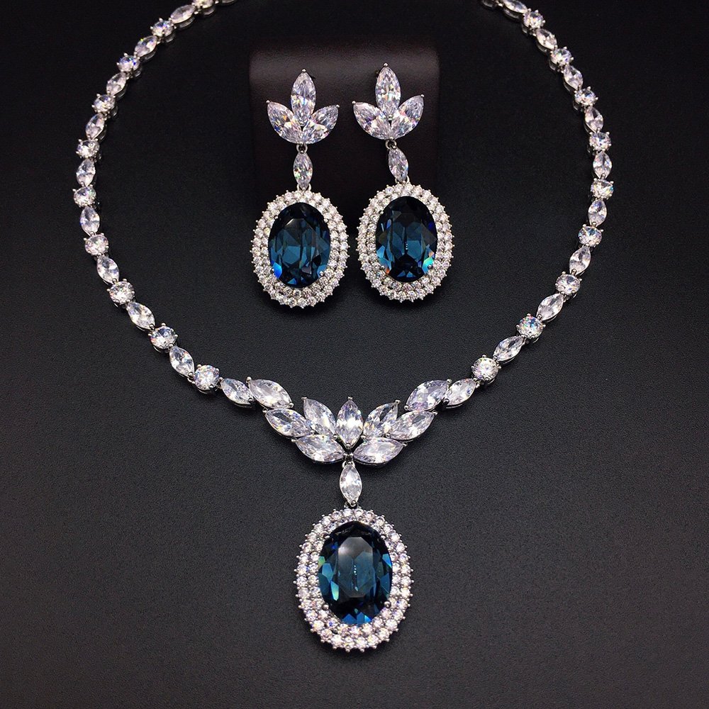 1304069-G100403E20Y.854.A Silver statement necklace and drop earrings set with leaf motif and oval cut Swarovski Element crystals wholesale