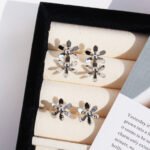 Wholesale metallic floral statement stud earrings with genuine 18K gold and white gold plating on copper
