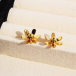 Wholesale metallic floral statement stud earrings with genuine 18K gold and white gold plating on copper