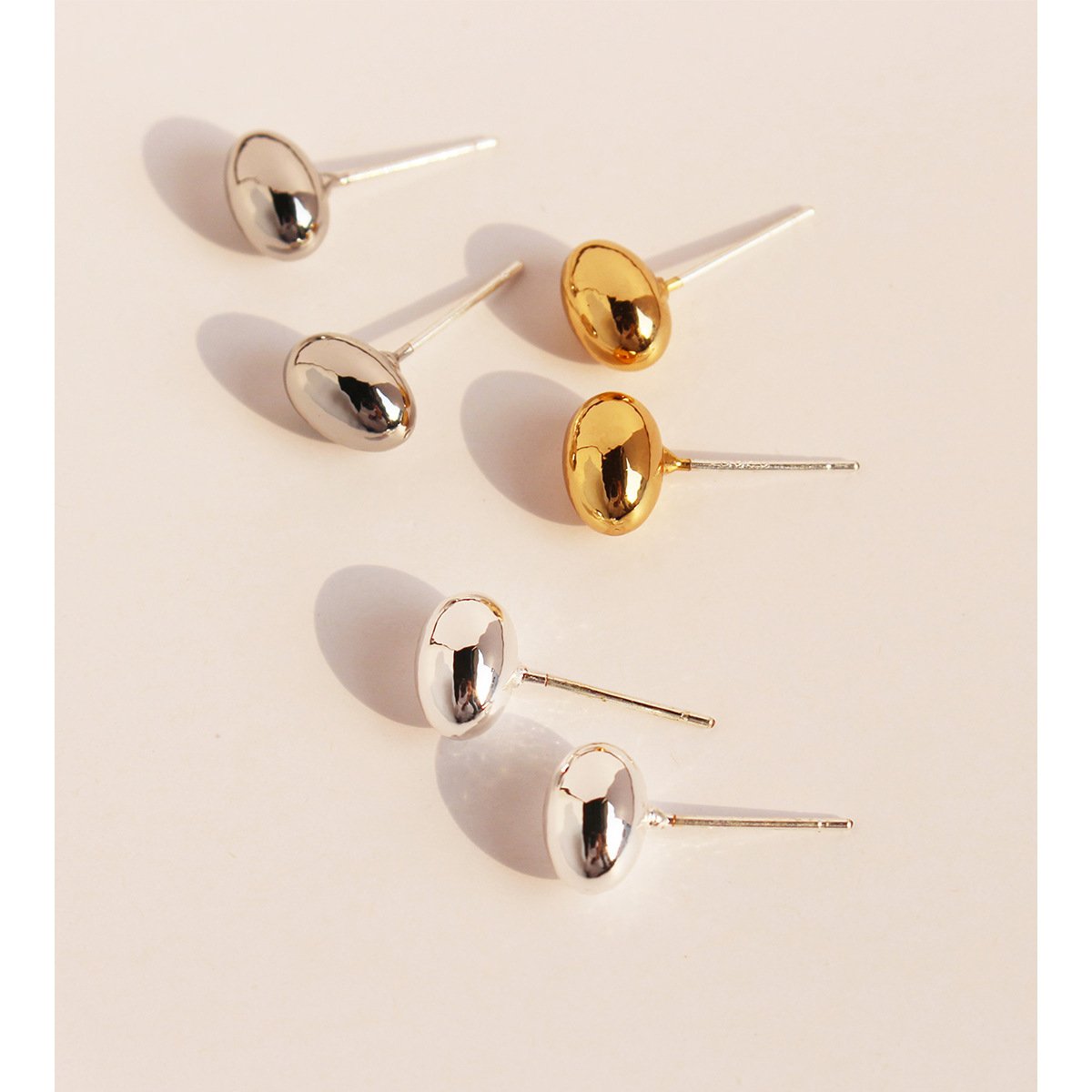 170 (3) Wholesale chunky oval pebble stud earrings with 18K gold, white gold, and silver plating on copper