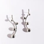 Wholesale curved branch graduated beaded statement earrings with genuine 18K gold and white gold plating on copper
