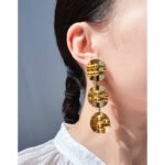 Wholesale avant-garde multi-disc statement dangle earrings with genuine 18K gold and white gold plating on copper