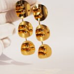 Wholesale avant-garde multi-disc statement dangle earrings with genuine 18K gold and white gold plating on copper