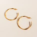 Wholesale large twisted wave hoop earrings with genuine 18K gold and white gold plating on copper