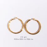 Wholesale classic textured bamboo wavy hoop earrings in multiple sizes with genuine 18K gold and white gold plating on copper Product Description