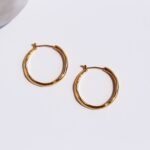Wholesale irregular wave wavy hoop earrings with genuine 18K gold and white gold plating on copper
