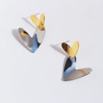 Wholesale modern two-tone asymmetric heart dangle earrings with genuine 18K gold and white gold plating on copper