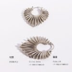 Wholesale modern sunburst radiant beam statement hoop earrings with genuine 18K gold and white gold plating on copper
