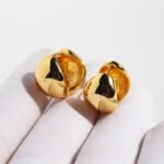 Wholesale bold chunky dome huggie hoop earrings with genuine 18K gold plating on copper