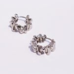 Wholesale modern ruffled textured molten huggie hoop earrings with genuine 18K gold and white gold plating on copper