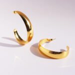 Wholesale chunky wide curved open hoop earrings with genuine 18K gold and white gold plating on copper