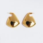 Wholesale chunky geometric curved drop statement earrings with genuine 18K gold plating on copper