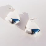 Wholesale chunky geometric curved drop statement earrings with genuine 18K gold plating on copper