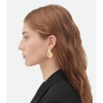 Wholesale chunky geometric curved drop statement earrings with genuine 18K gold plating on copper