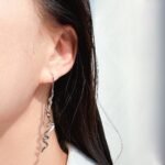 Wholesale wave spiral twist long drop earrings with genuine 18K gold and white gold plating on copper