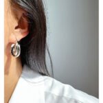 Wholesale modern twisted crossover intertwined hoop earrings with genuine 18K gold and white gold plating on copper