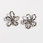 Wholesale modern beaded disc cutout floral stud earrings with genuine 18K gold and white gold plating on copper