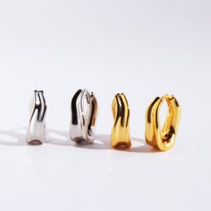Wholesale modern sculptural twisted wave huggie hoop earrings with genuine 18K gold and white gold plating on copper