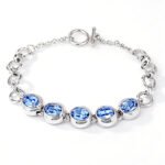 Silver and gold chain bracelet with oval bezel set Swarovski Element crystals and toggle clasp wholesale