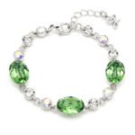 Silver bracelet with oval colorful Swarovski Element crystals and round clear accent crystals wholesale