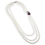 Shell pearl layered necklace wholesale featuring multi-strand white shell pearl long lariat with pavé purple and green cubic zirconia peacock clasp on palladium plated copper.