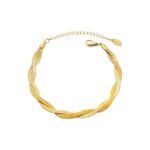 Gold plated stainless steel twisted herringbone flat snake chain bracelet on wrist