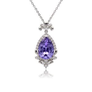 Silver vintage filigree teardrop pendant necklace with pavé halo framing a faceted Swarovski Element crystal wholesale