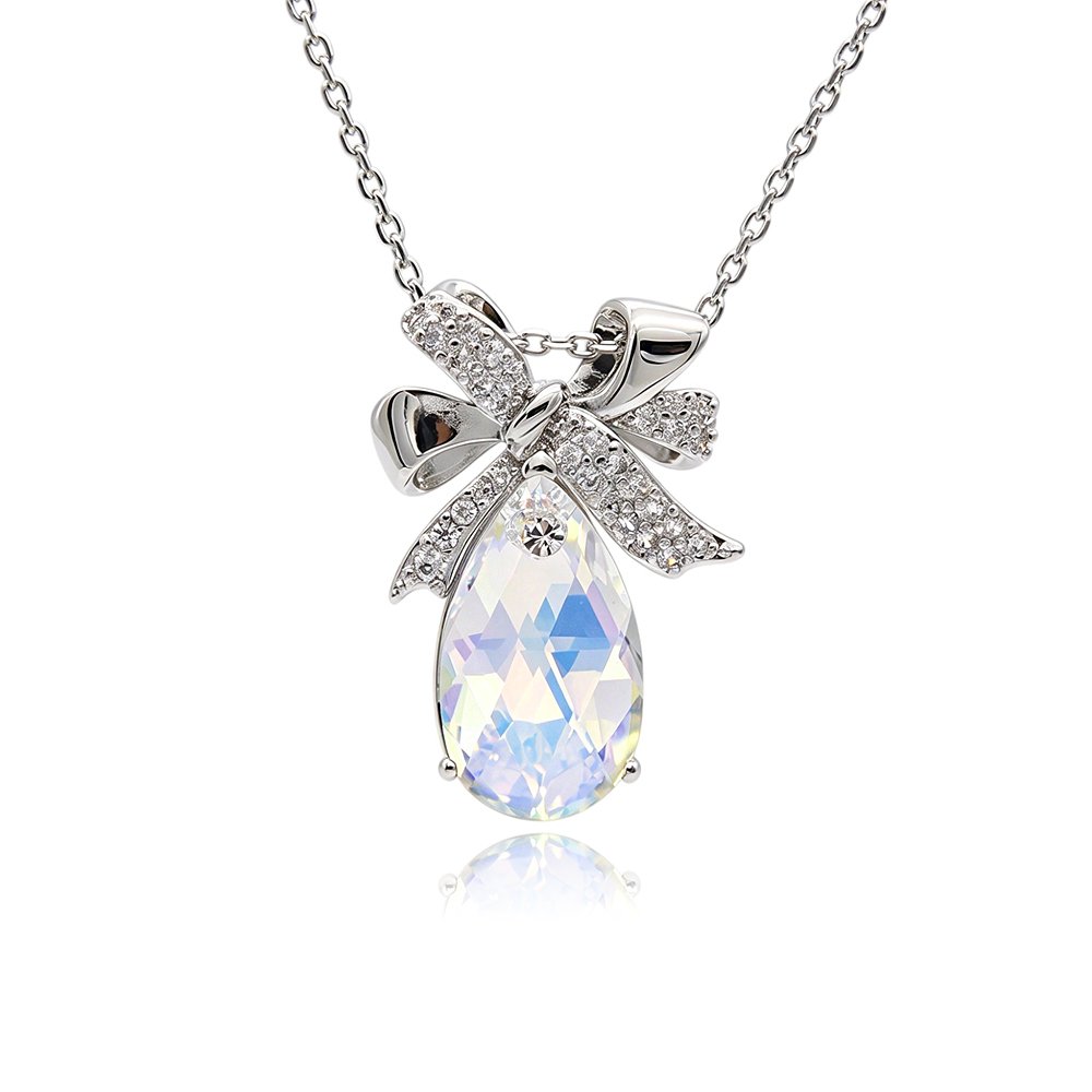 Silver ribbon bow pendant necklace with micro-pavé accents holding a teardrop Swarovski Element crystal wholesale