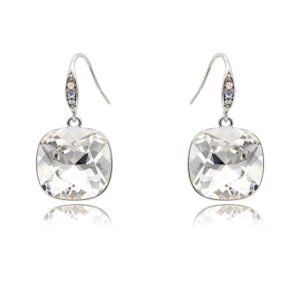 These Swarovski Element earrings feature a brilliant cushion-cut crystal suspended from a paved French hook. The delicate earring hook is detailed with sparkling accent stones to add subtle elegance. Furthermore, this classic solitaire design gives boutique owners an essential core staple for daily wear collections and formal gift displays. Additionally, the drop earrings use a durable copper base finished with high-polish Palladium Plating. The comfortable ear wire ensures secure and easy daily wear for your retail customers. Moreover, the extraordinary clarity of genuine Swarovski Element components provides retail buyers with strong sales appeal. You can explore our full Swarovski Element Jewelry collection today. You can also check our latest fashion jewelry wholesale arrivals to upgrade your store inventory. Key Features of Swarovski Element EarringsLarge cushion-cut Swarovski Element main crystal in a sleek bezel frame Elegant French hook ear wire decorated with micro-pavé accent stones High-quality copper base structure finished with high-shine Palladium Plating Popular Swarovski Element drop earrings available in multiple vibrant color options Perfect ForJewelry Boutiques Fashion Boutiques Online Jewelry Stores Gift Shops Department Stores Wholesale AdvantagesNo MOQ required Mixed styles and colors supported OEM/ODM and custom production available Competitive wholesale pricing with global shipping support