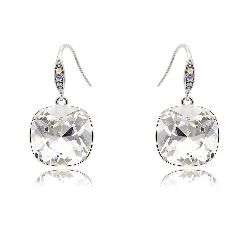 These Swarovski Element earrings feature a brilliant cushion-cut crystal suspended from a paved French hook. The delicate earring hook is detailed with sparkling accent stones to add subtle elegance. Furthermore, this classic solitaire design gives boutique owners an essential core staple for daily wear collections and formal gift displays. Additionally, the drop earrings use a durable copper base finished with high-polish Palladium Plating. The comfortable ear wire ensures secure and easy daily wear for your retail customers. Moreover, the extraordinary clarity of genuine Swarovski Element components provides retail buyers with strong sales appeal. You can explore our full Swarovski Element Jewelry collection today. You can also check our latest fashion jewelry wholesale arrivals to upgrade your store inventory. Key Features of Swarovski Element EarringsLarge cushion-cut Swarovski Element main crystal in a sleek bezel frame Elegant French hook ear wire decorated with micro-pavé accent stones High-quality copper base structure finished with high-shine Palladium Plating Popular Swarovski Element drop earrings available in multiple vibrant color options Perfect ForJewelry Boutiques Fashion Boutiques Online Jewelry Stores Gift Shops Department Stores Wholesale AdvantagesNo MOQ required Mixed styles and colors supported OEM/ODM and custom production available Competitive wholesale pricing with global shipping support