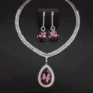 Silver statement necklace and drop earrings set with leaf motif and pear-cut Swarovski Element crystals wholesale