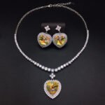 Silver tennis necklace and drop earrings set with heart cut Swarovski Element crystals and pave halo wholesale