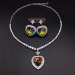Silver tennis necklace and drop earrings set with heart cut Swarovski Element crystals and pave halo wholesale