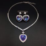 Silver tennis necklace and drop earrings set with heart cut Swarovski Element crystals and pave halo wholesale