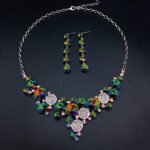 Silver statement necklace and drop earrings set with mixed round Swarovski Element crystals and pavé discs wholesale