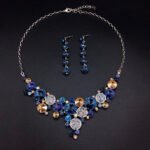 Silver statement necklace and drop earrings set with mixed round Swarovski Element crystals and pavé discs wholesale