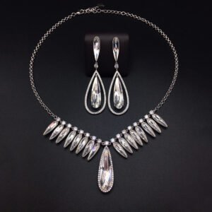 Silver statement necklace and drop earrings set with clear teardrop and marquise Swarovski Element crystals wholesale