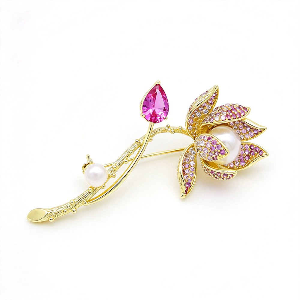 Gold flower brooch pin with micro-pavé cubic zirconia petals, pear pink CZ bud, and elegant shell pearls wholesale