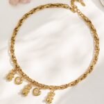 Gold plated chunky rolo chain necklace with 3D teddy bear and cz bezel heart charms in 316L stainless steel