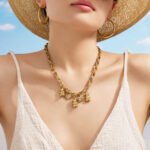 Gold plated chunky rolo chain necklace with 3D teddy bear and cz bezel heart charms in 316L stainless steel