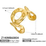 Wide hammered gold and silver plated open cuff bangle with organic oval cutout in 316L stainless steel