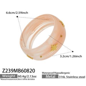 Gold plated starburst inlaid wide resin bangle bracelet in 316L stainless steel