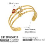 Multi band gold and silver open cuff bangles featuring pave cubic zirconia moon stars and lucky charm motifs in 316L stainless steel