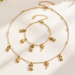 18K gold plated 316L stainless steel whimsical pave CZ owl apple palm tree charm necklace and bracelet set wholesale