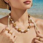 Gold and silver plated chunky irregular molten metal and baroque pearl statement necklace and bracelet set in stainless steel