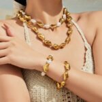 Gold and silver plated chunky irregular molten metal and baroque pearl statement necklace and bracelet set in stainless steel
