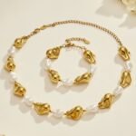 Gold and silver plated chunky irregular molten metal and baroque pearl statement necklace and bracelet set in stainless steel