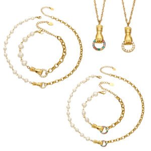 Gold plated vintage sculpted hand clasp pearl chain necklace and bracelet set with cubic zirconia in stainless steel