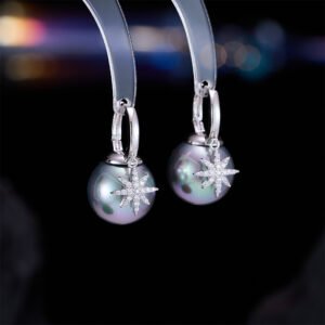 Starburst pearl hoop earrings wholesale featuring high luster champagne gold, peacock black, and classic golden shell pearls with pavé cubic zirconia North Star charm on 18k gold and palladium plated brass.