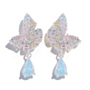 Pastel butterfly crystal earrings wholesale featuring pave cubic zirconia butterfly posts with dangling ice blue and soft pink teardrop crystal drops on palladium plated copper base.